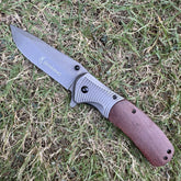 Browning Folding Knife – Wooden Handle with Grey Stainless Steel Blade